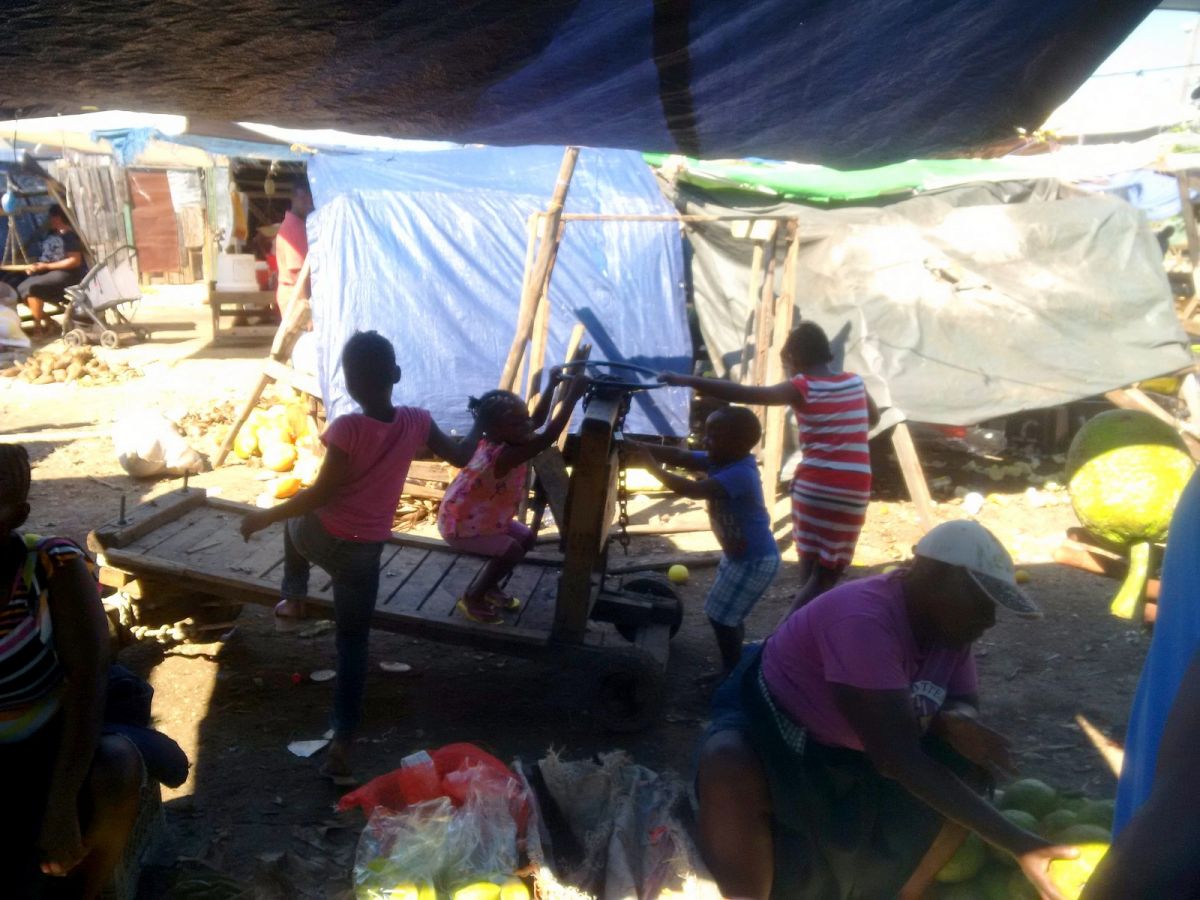 Kids on a handcart