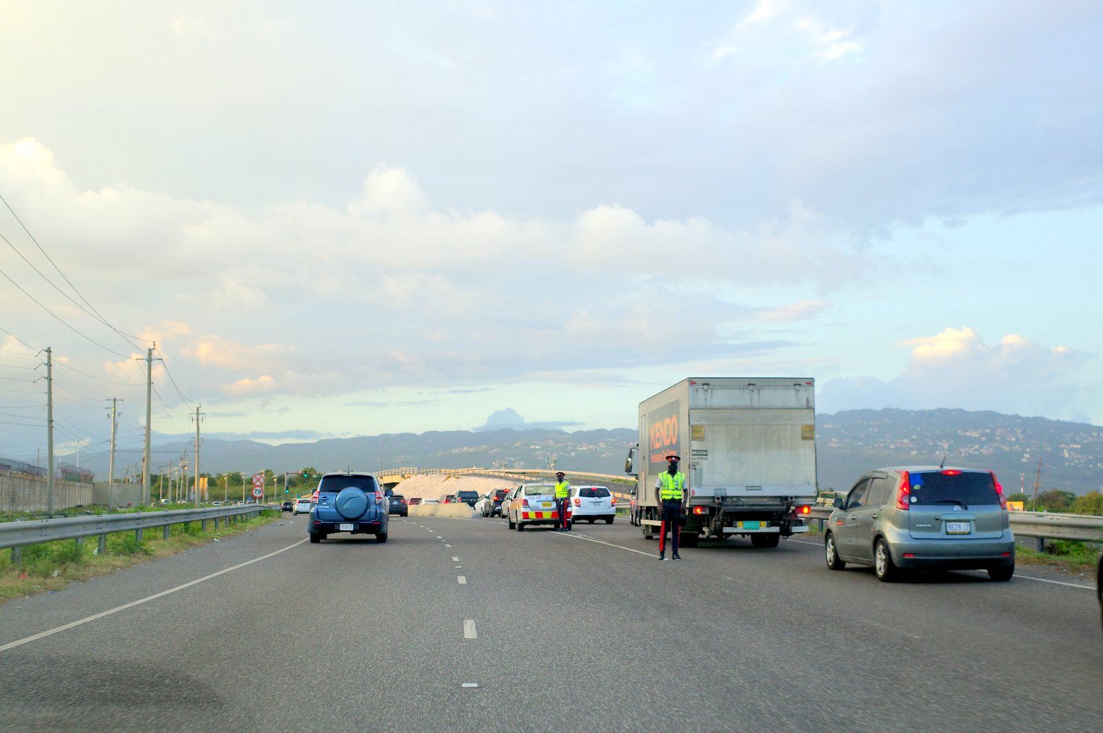 Sometimes they cause more traffic by parking right there blocking a 3rd of the middle lane.